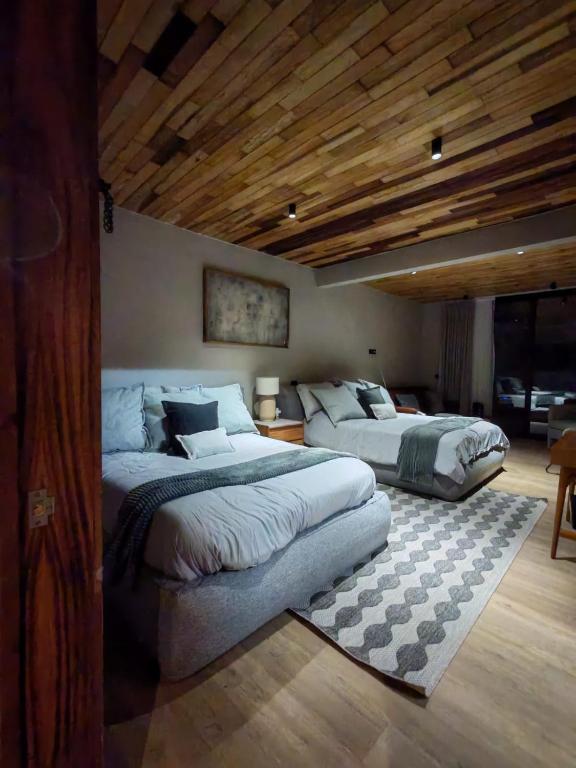 Postel nebo postele na pokoji v ubytování Serenzzo Hotel & Cuisine