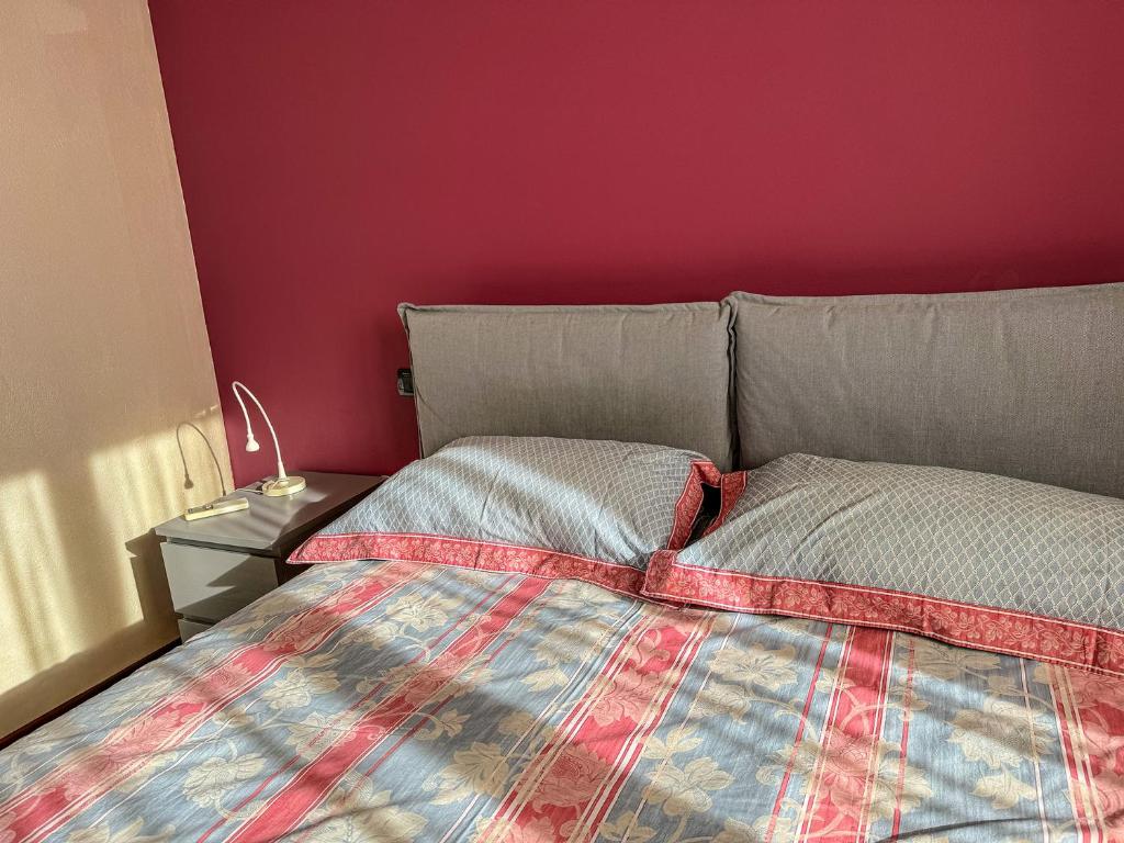 Postel nebo postele na pokoji v ubytování Residence Franciacorta