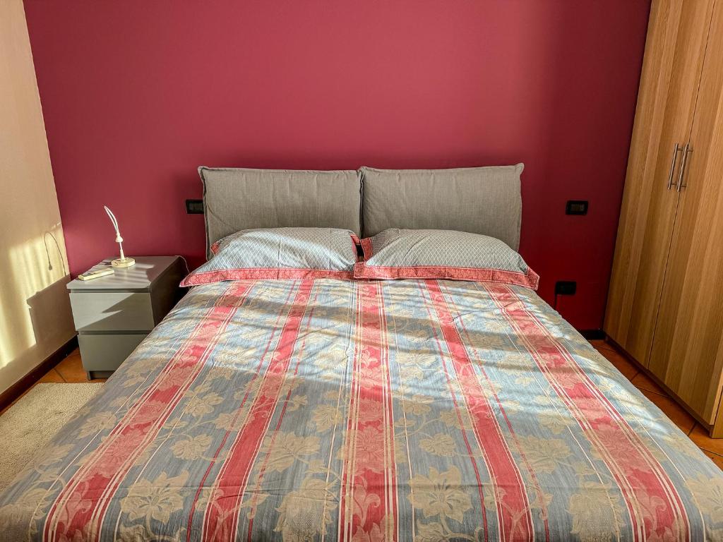 Postel nebo postele na pokoji v ubytování Residence Franciacorta