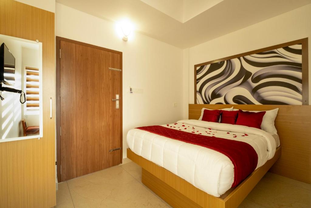 Postel nebo postele na pokoji v ubytování Hotel Eden Palace