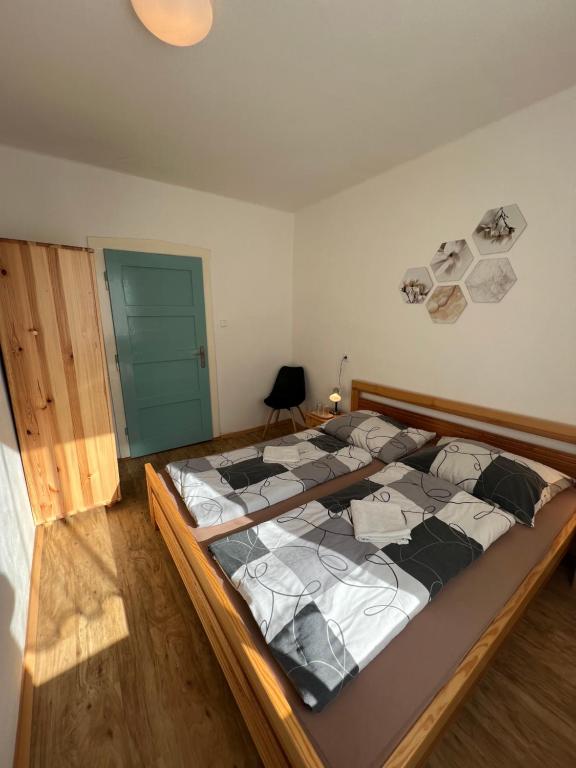 Postel nebo postele na pokoji v ubytování Penzion Star Doksy