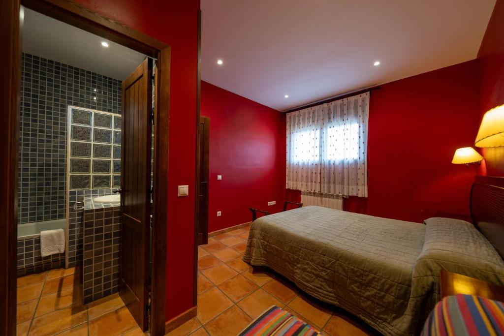 Posteľ alebo postele v izbe v ubytovaní CASA RURAL MIRALTAJO