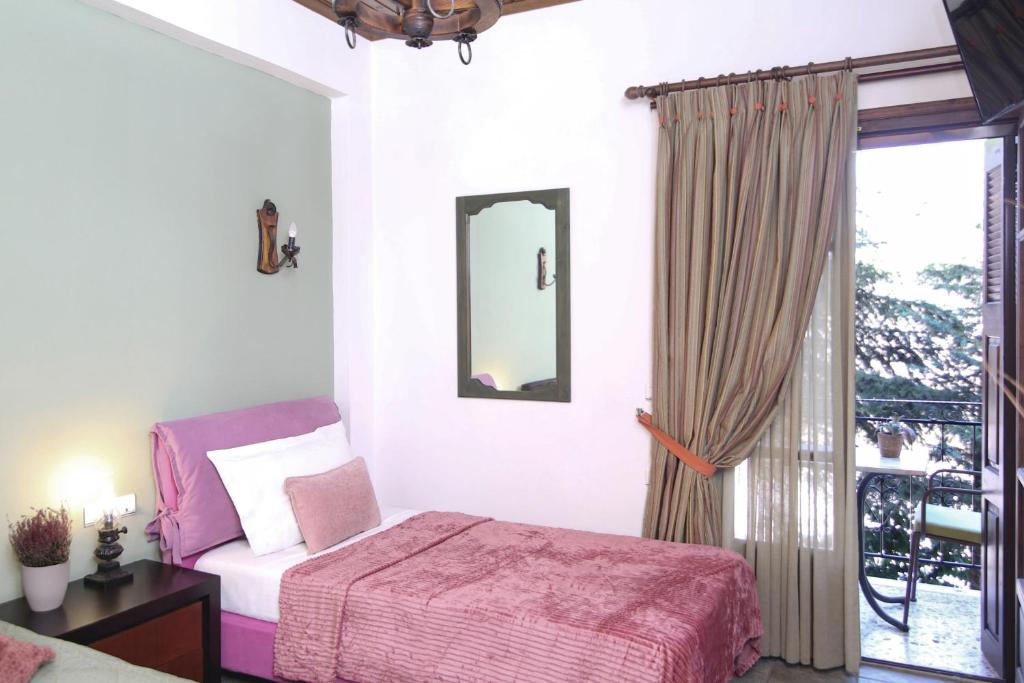 Postel nebo postele na pokoji v ubytování Guesthouse Alexandra