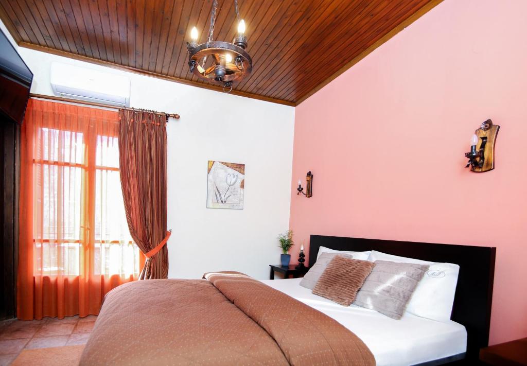 Postel nebo postele na pokoji v ubytování Guesthouse Alexandra
