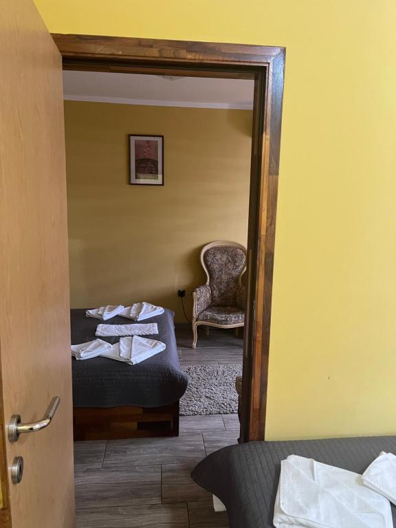 Postel nebo postele na pokoji v ubytování Hotel "VIR"