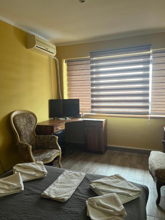 TV a/nebo společenská místnost v ubytování Hotel "VIR"