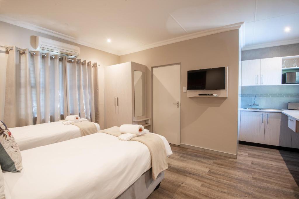 Arebbusch Travel Lodge - Chalet Mit Zwei Einzelbetten