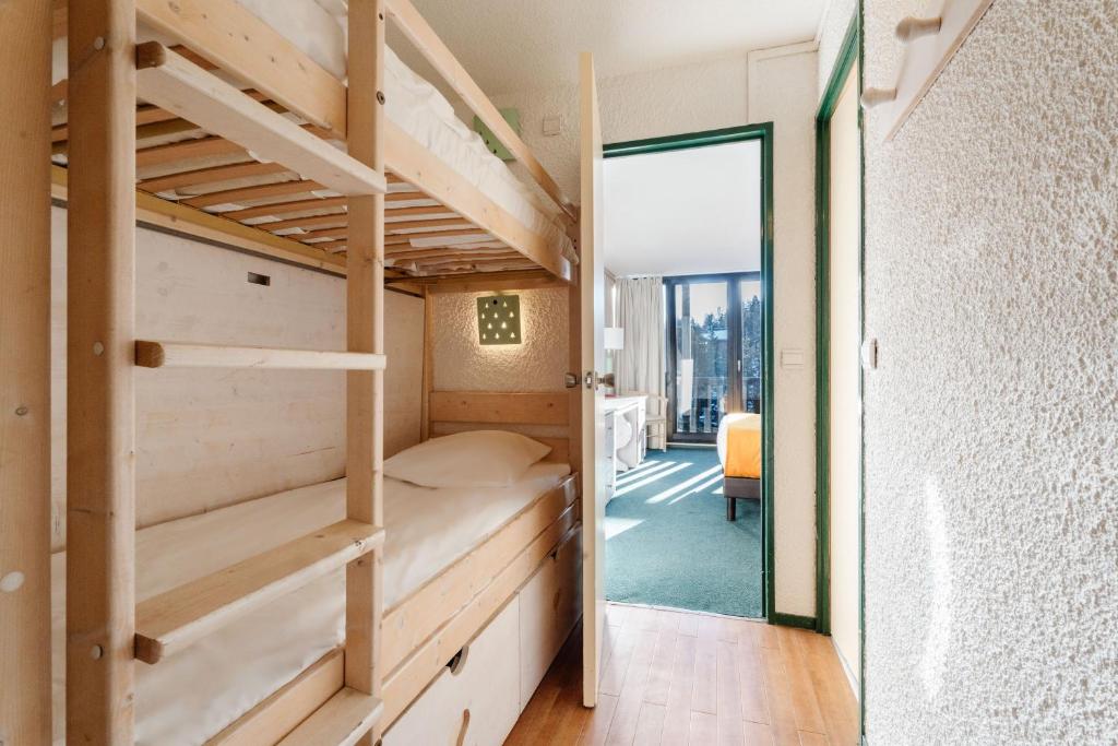 Postel nebo postele na pokoji v ubytování Lake Hotel Courchevel 1850