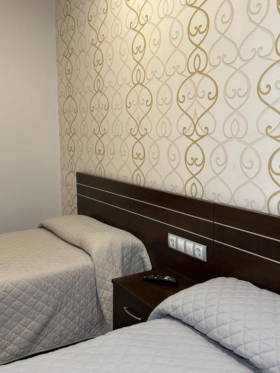 Postel nebo postele na pokoji v ubytování Hostal Venecia