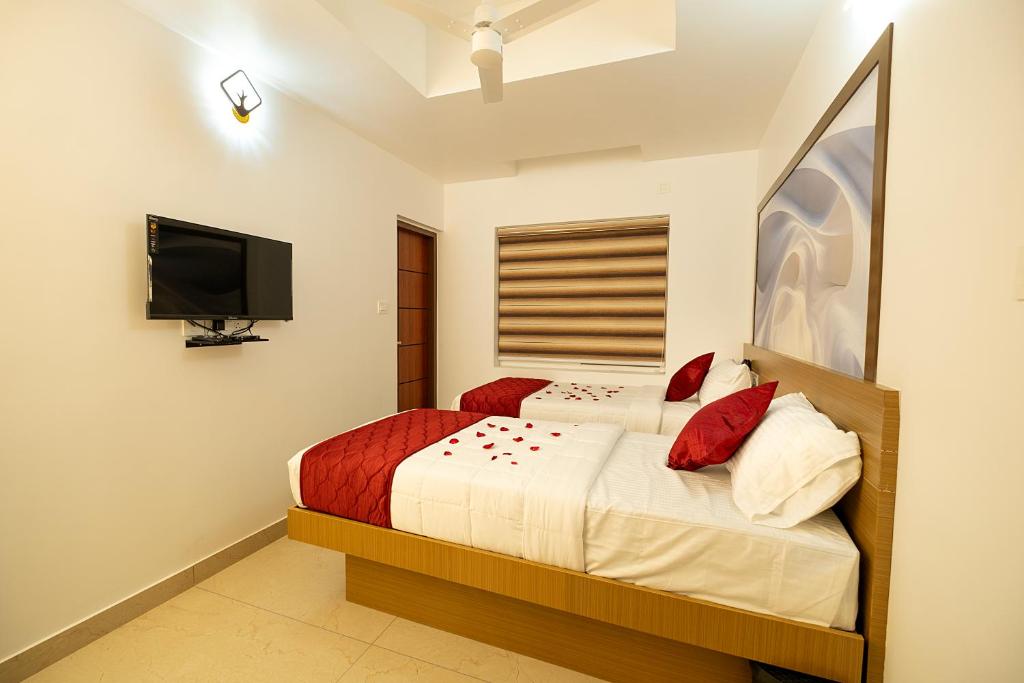 Postel nebo postele na pokoji v ubytování Hotel Eden Palace