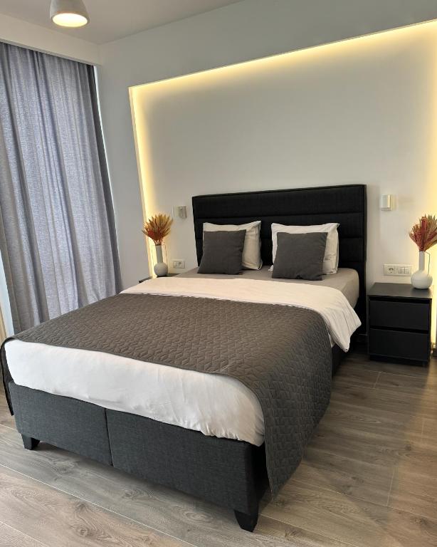 Postel nebo postele na pokoji v ubytování LaHuzur - Casa de Vacanta - Therme Balotesti & Aeroport Otopeni