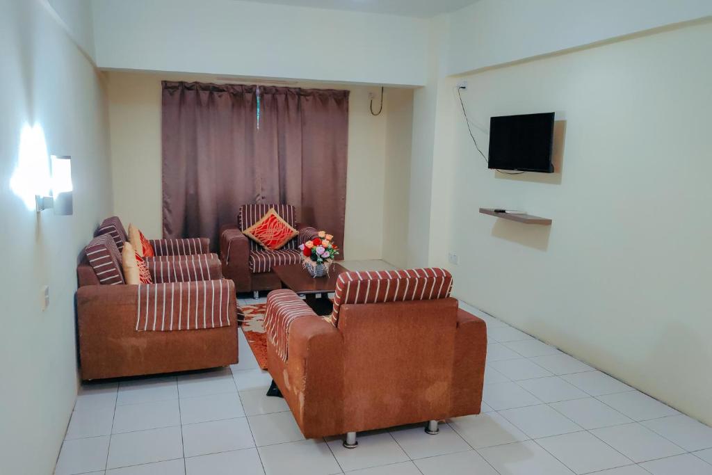 TV a/nebo společenská místnost v ubytování Virgo Batik Resort Teluk Batik Lumut