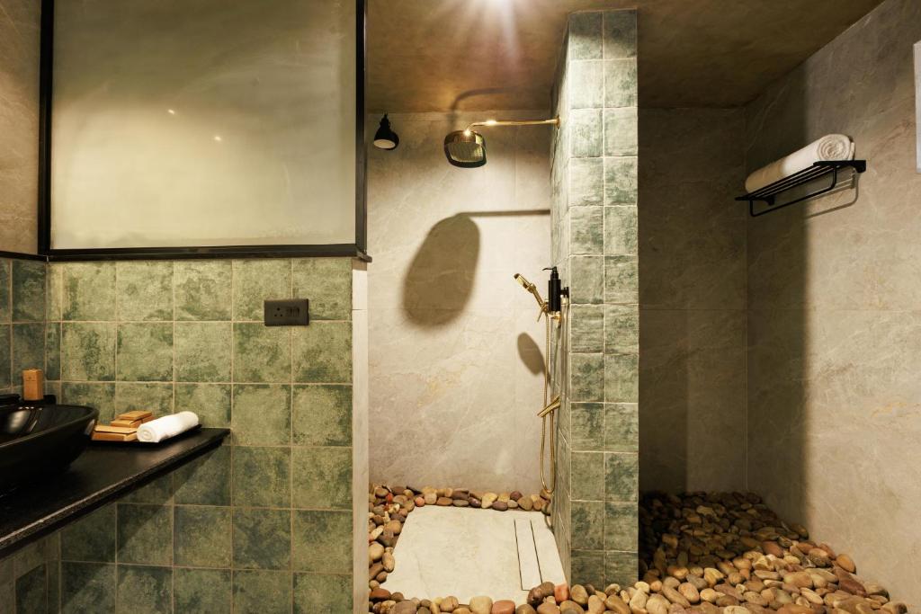 Koupelna v ubytování Jungle Park Resort by GreenEscapes
