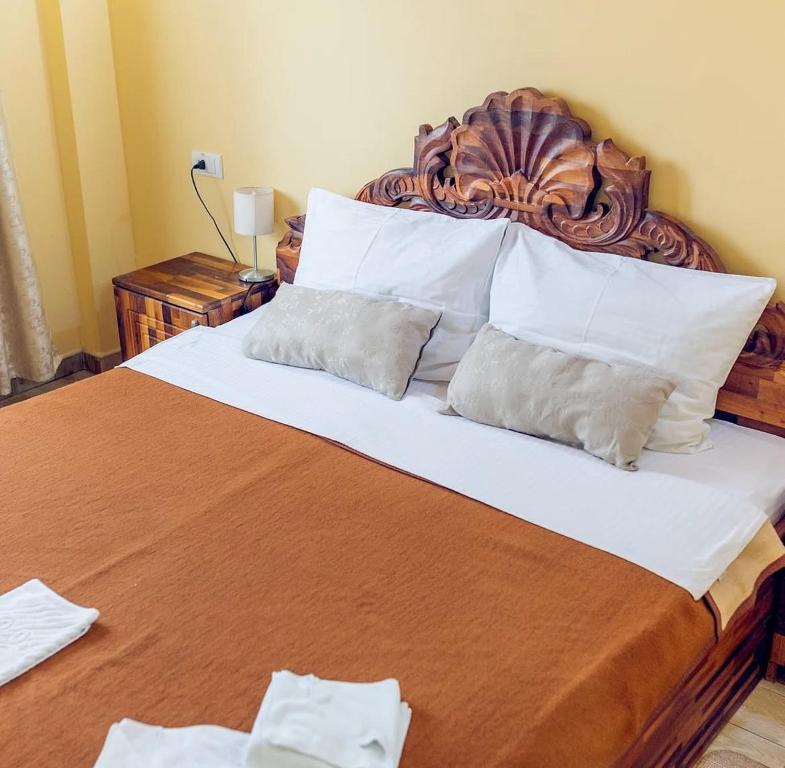 Postel nebo postele na pokoji v ubytování Hotel "VIR"