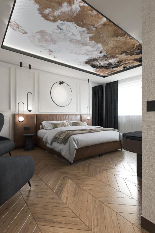 Postel nebo postele na pokoji v ubytování Hotel Kristall