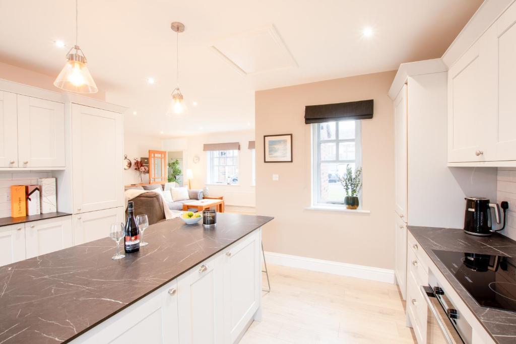 Køkken eller tekøkken på Northern Hideaways Shore Cottage, Beadnell