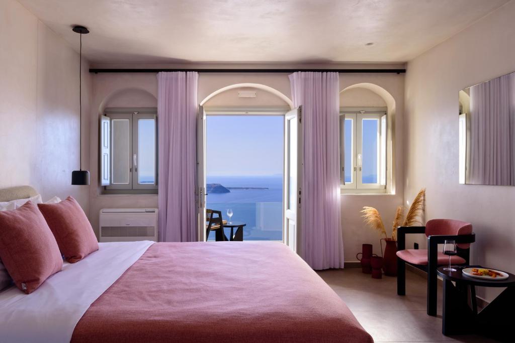 Postel nebo postele na pokoji v ubytování Andromeda Villas & Spa Resort