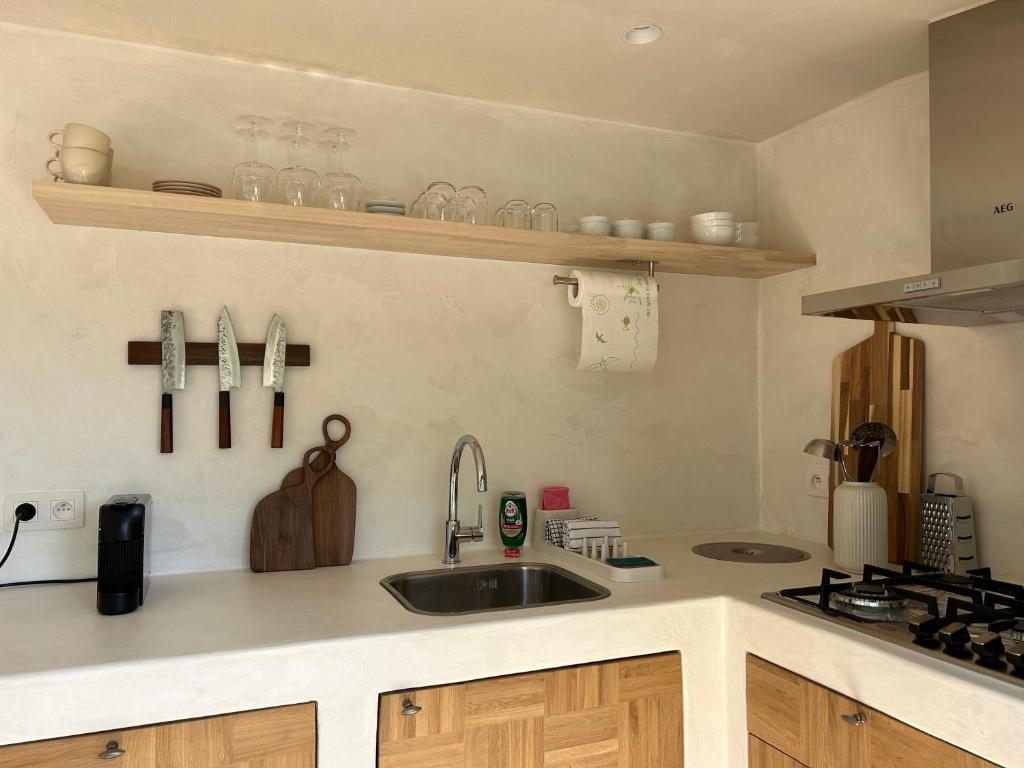 Kuchyň nebo kuchyňský kout v ubytování Chalet Leon
