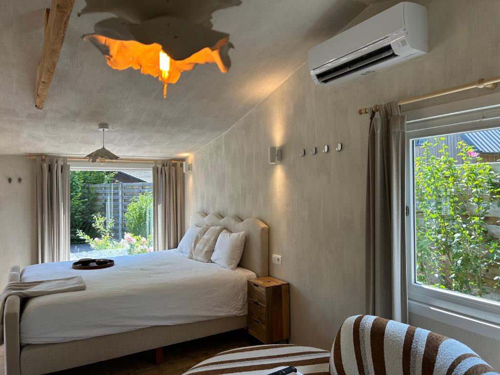 Postel nebo postele na pokoji v ubytování Chalet Leon