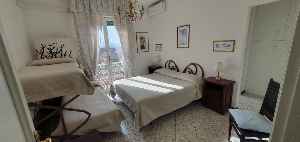 Postel nebo postele na pokoji v ubytování Guest House Attico Della Vittoria