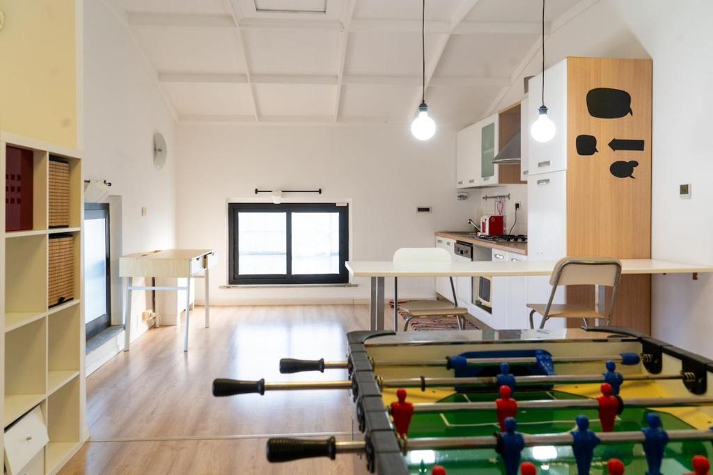 Kuchyň nebo kuchyňský kout v ubytování La Manovella Apartment