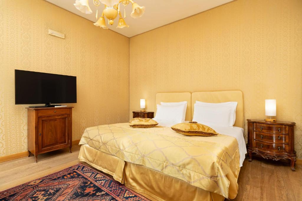TV a/nebo společenská místnost v ubytování Relais Alberti