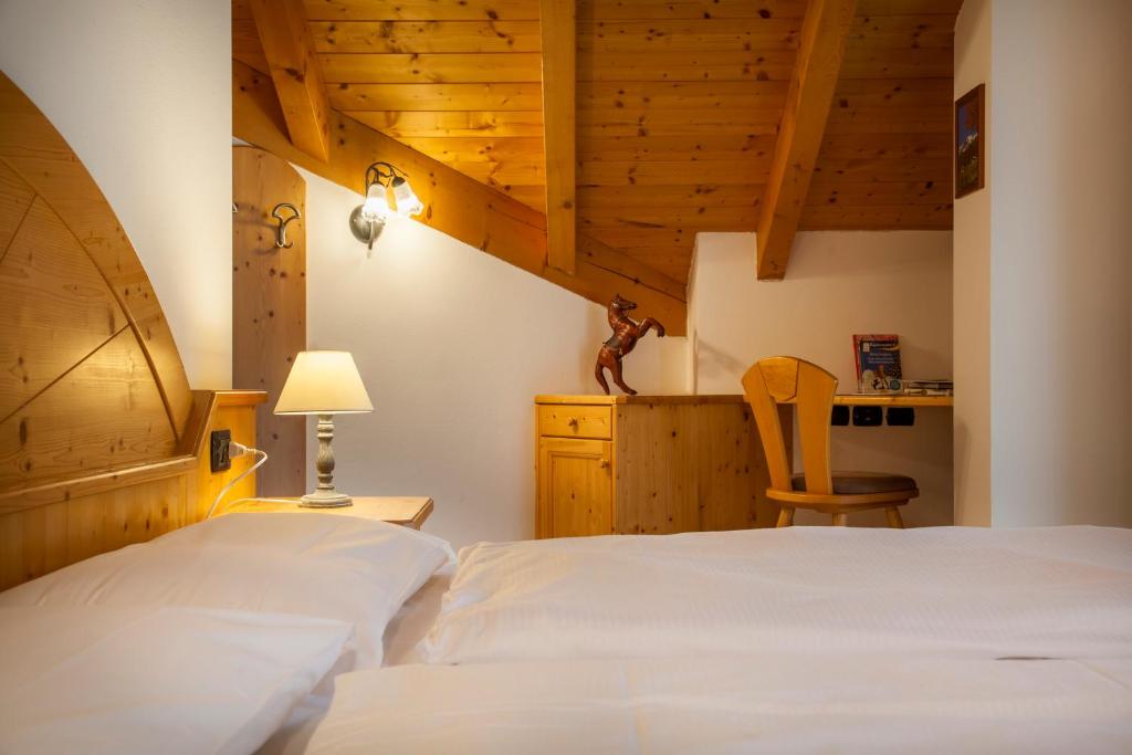Postel nebo postele na pokoji v ubytování Agritur Bontempelli