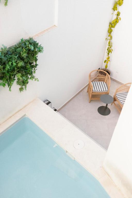 Bazén v ubytování Hotel Boutique Sidonia nebo v jeho okolí