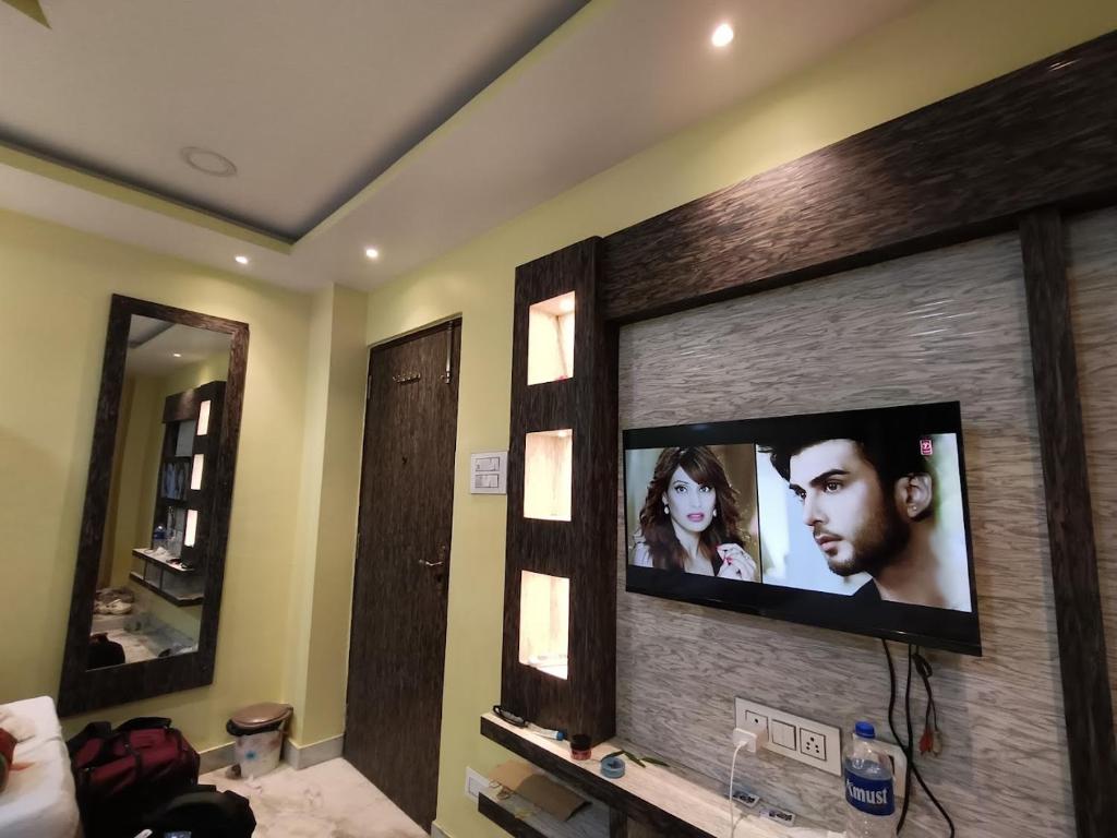 TV a/nebo společenská místnost v ubytování Sidra Guest House
