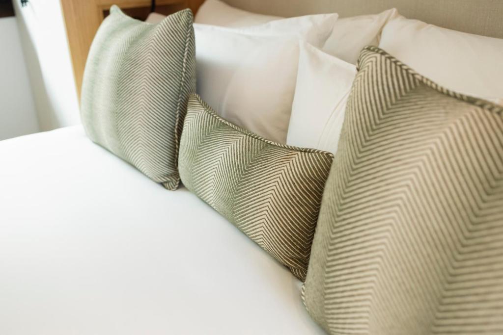 Postel nebo postele na pokoji v ubytování Hotel Boutique Sidonia
