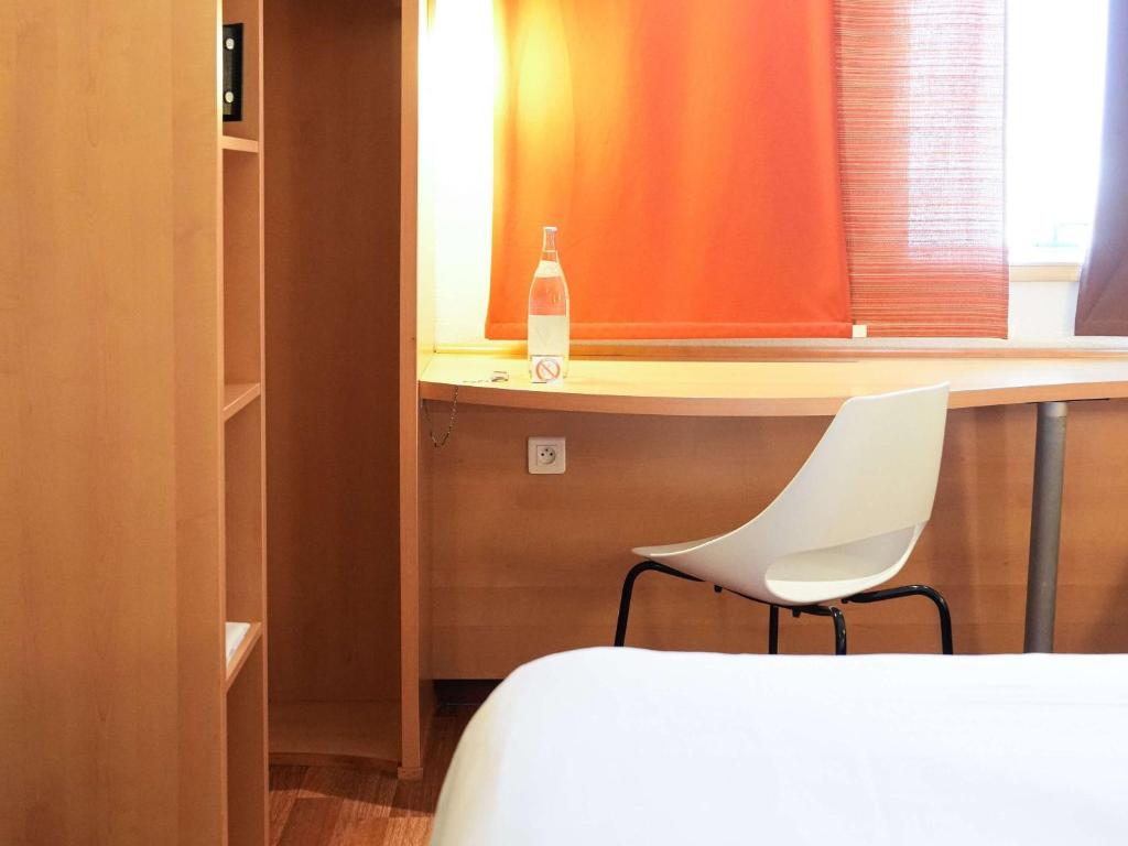 Postel nebo postele na pokoji v ubytování Ibis Tunis