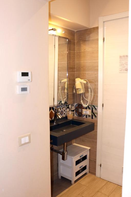 Kuchyň nebo kuchyňský kout v ubytování ALBERGO LOCANDA DIANA