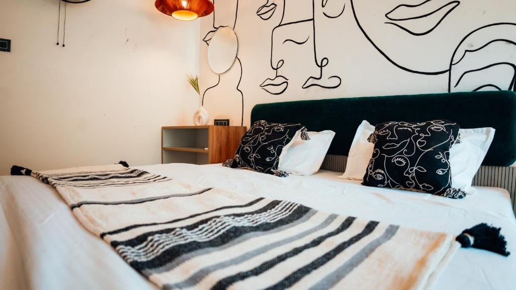 Postel nebo postele na pokoji v ubytování Art Bliss Hostel