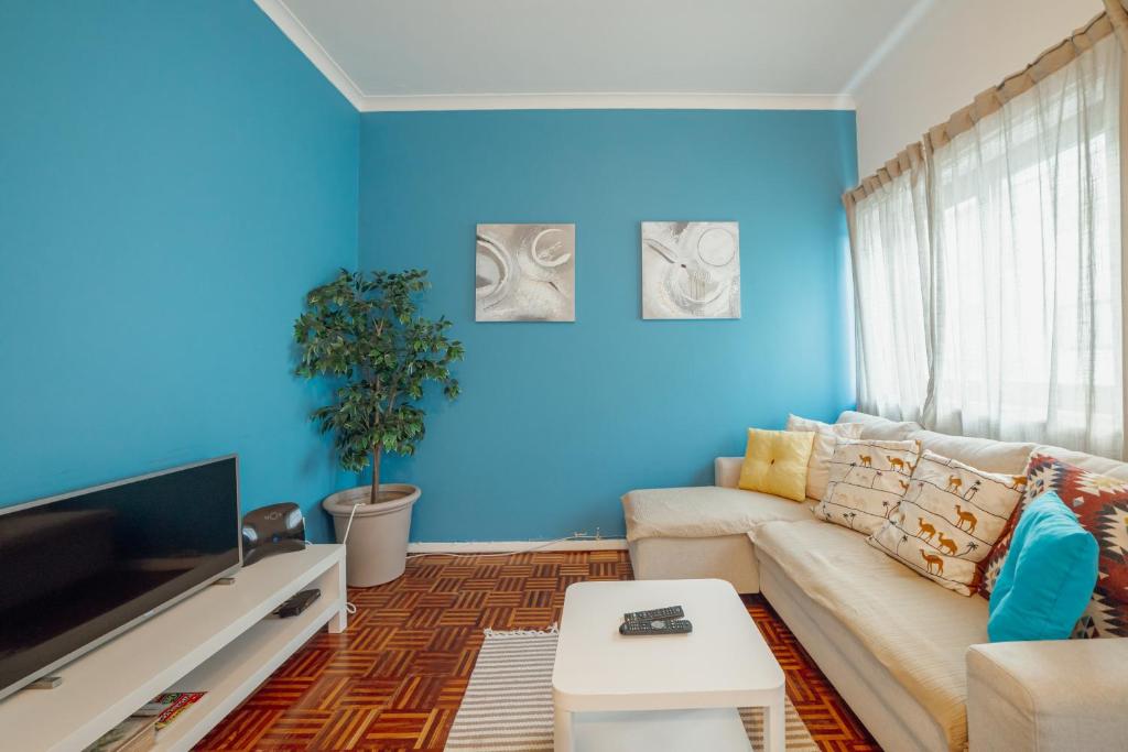 Et tv og/eller underholdning på Summer Espinho Flat by Vacationy