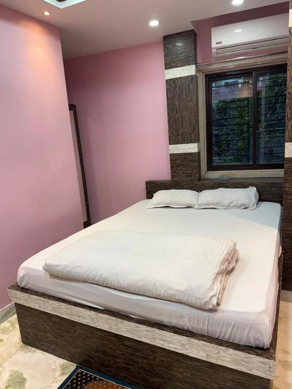 Postel nebo postele na pokoji v ubytování Sidra Guest House