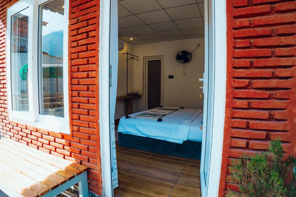 Postel nebo postele na pokoji v ubytování Art Bliss Hostel