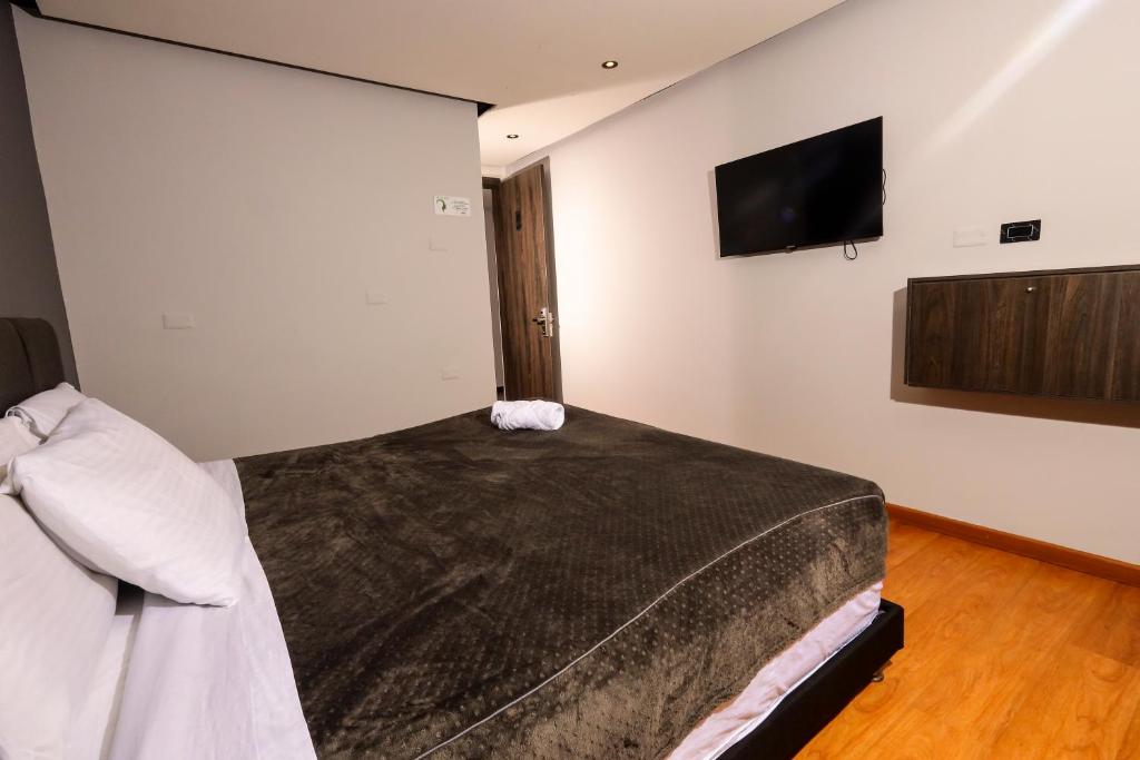 Postel nebo postele na pokoji v ubytování HOTEL HTL