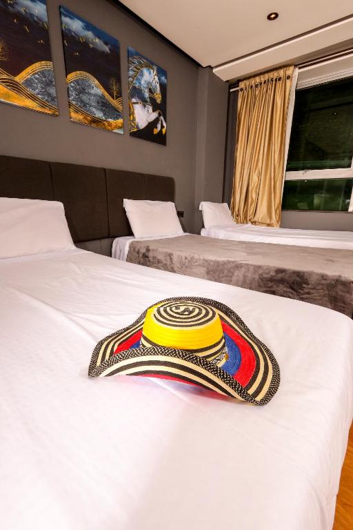 Postel nebo postele na pokoji v ubytování HOTEL HTL