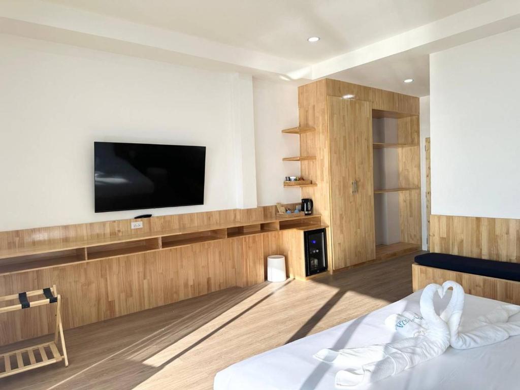 TV a/nebo společenská místnost v ubytování Ibiza Beach Club Koh Tao