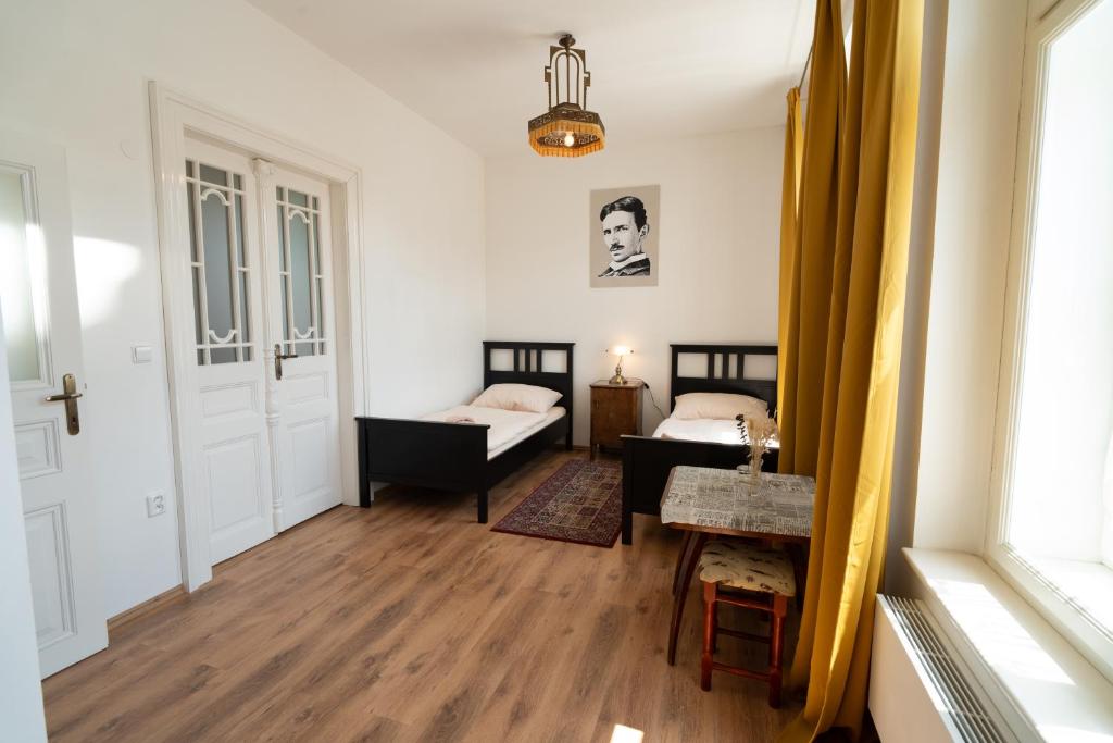 Postel nebo postele na pokoji v ubytování Zbirožský dvůr