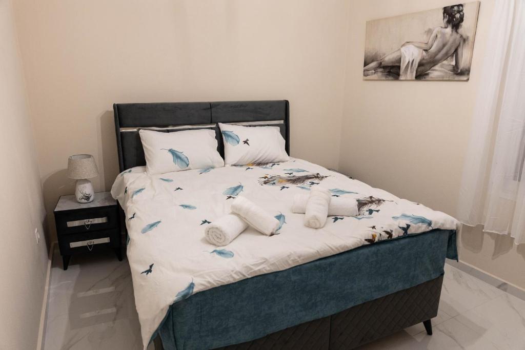 Postel nebo postele na pokoji v ubytování Comfortable Suites 1