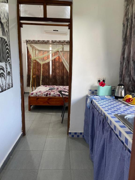 Postel nebo postele na pokoji v ubytování pole inn villa