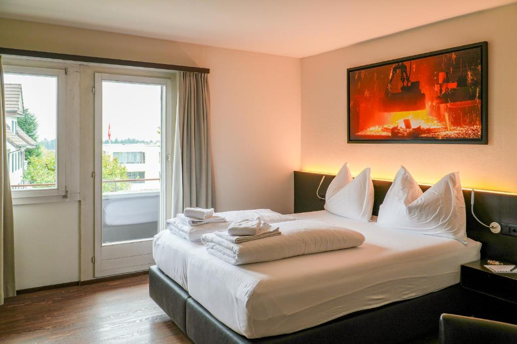 Letto o letti in una camera di feRUS Hotel