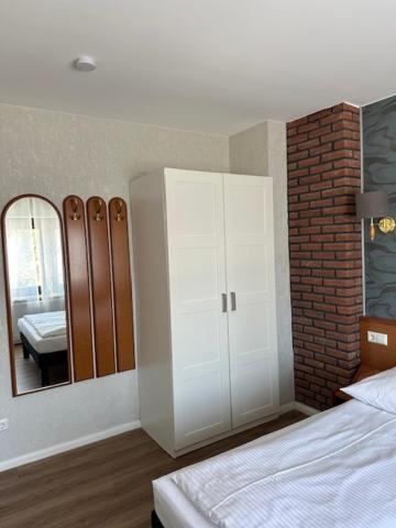 Postel nebo postele na pokoji v ubytování Hotel Pirol