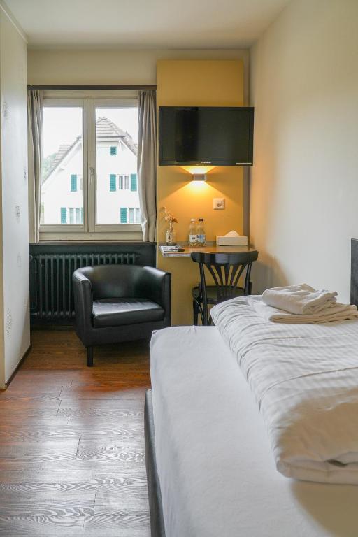 Letto o letti in una camera di feRUS Hotel