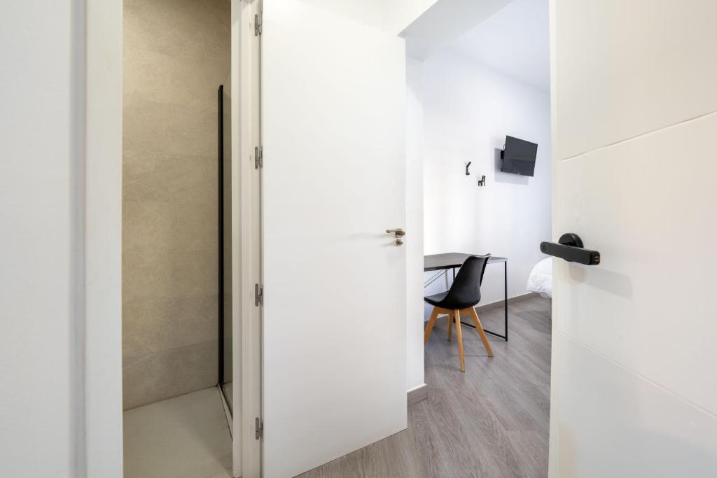 Telewizja i/lub zestaw kina domowego w obiekcie BF Rooms Almeria Centro