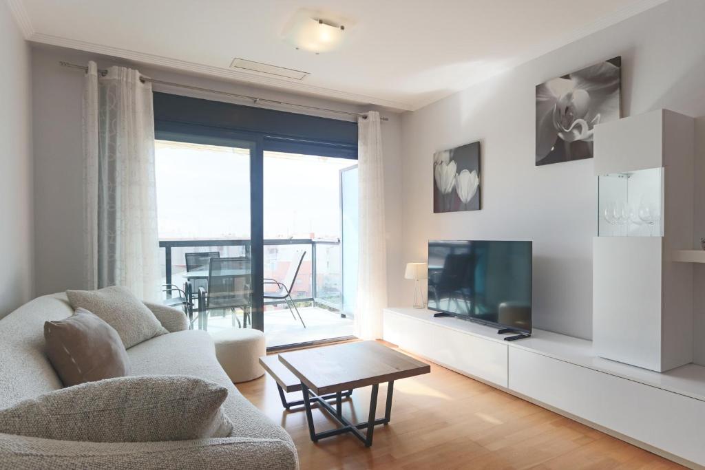 TV a/nebo společenská místnost v ubytování 011 - Residencial Bahía 002 - comfortHOLIDAYS