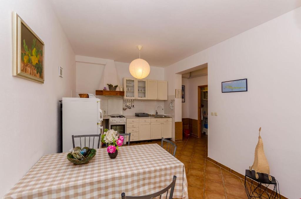 Kuchyň nebo kuchyňský kout v ubytování Apartments Josip