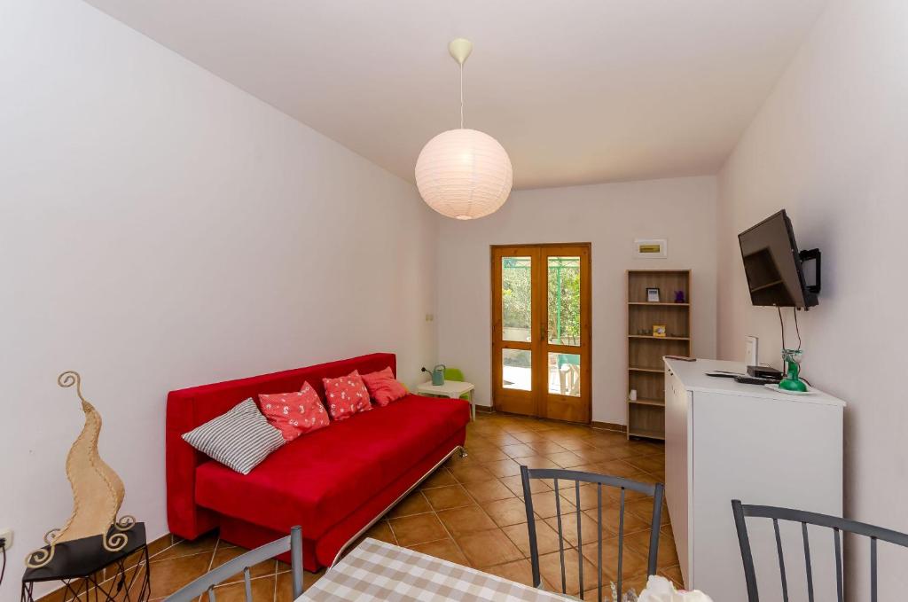TV a/nebo společenská místnost v ubytování Apartments Josip