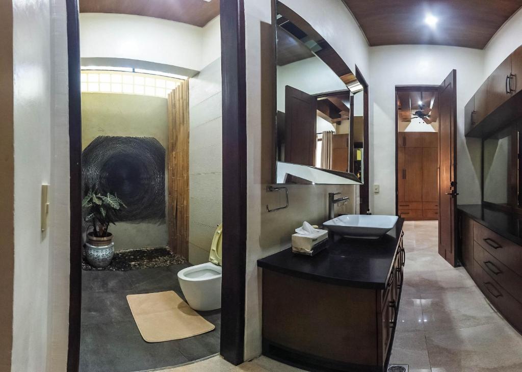 Koupelna v ubytování CORON RIVERSIDE Guesthouse
